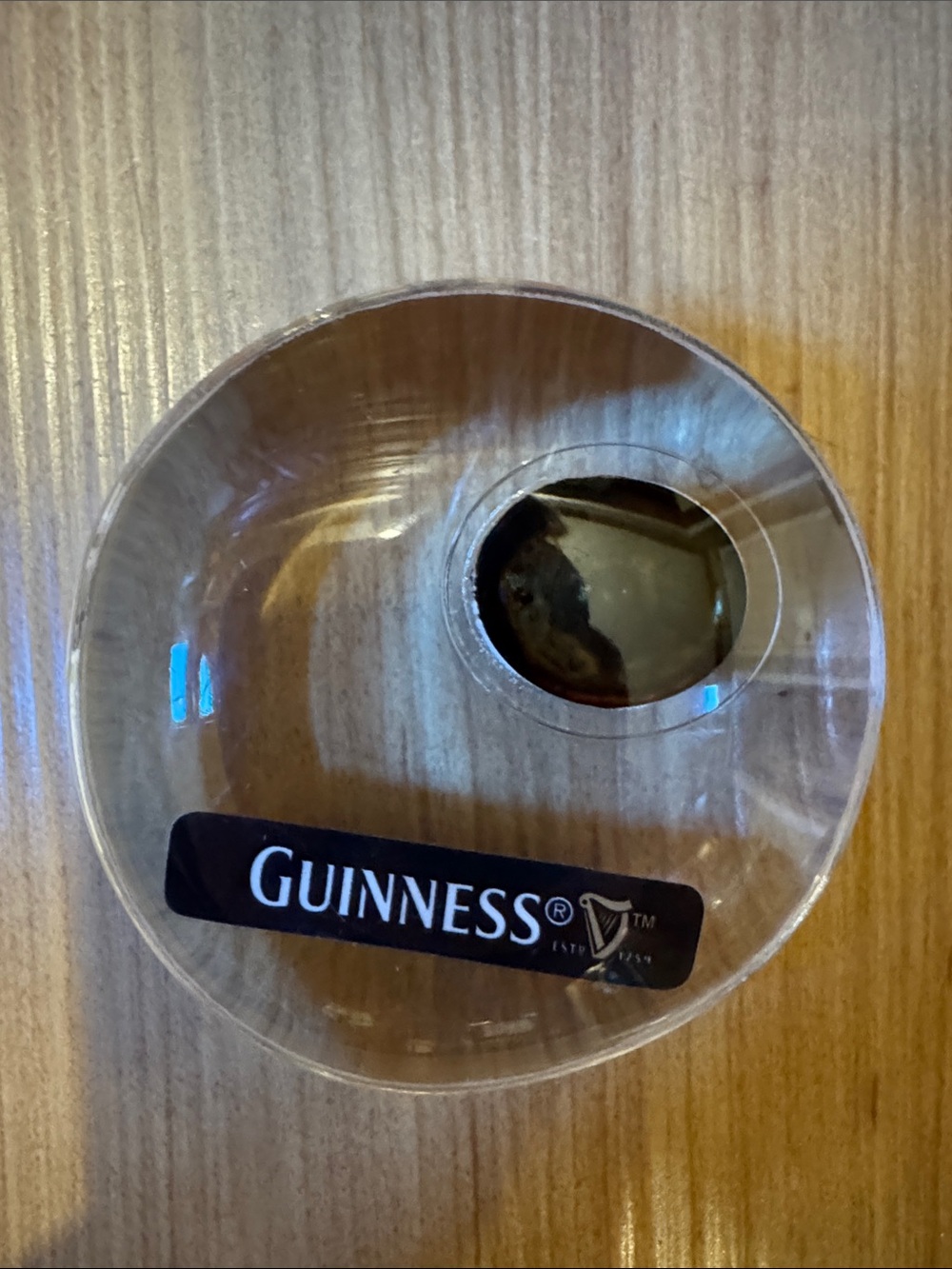 Guinness Clear Resin Paperweight with Black and Gold Accent